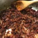 Continue cooking and stirring occasionally for up to 3 hours. You're looking for the bacon jam to turn a nice dark, chocolate brown color. Be careful as the last of the liquid evaporates. You don't want to burn it at the end, and it can happen fast!
