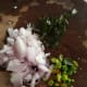 The onion, ginger-garlic and curry leaves.