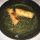 Submerge in oil on medium heat, until golden brown.