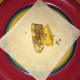 Place one slice of banana and mango on the spring roll wrapper. Make sure you are using a dry surface so that the wrapper won't stick.