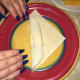 Begin to roll. Half way through tuck in each end and then finish rolling. At the end take a small amount of water and seal the edge.