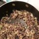 Stir rice into the onion and sage, cook for 1-2 minutes
