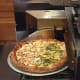 1/2 Chicken Alfredo and 1/2 Veggies minus the olives and pineapples at Eat-N-Out Pizza & Gelato