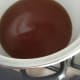 Add sugar mixture to vinegar. Cook until the sugar has dissolved.