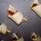 All lined up on parchment paper and ready to go into the oven