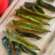 Roasting the peppers before adding to the salsa gives a fuller flavor.