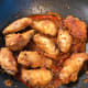 Throw the chicken into the sauce.