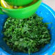 Shred the kale and and massage in the lemon juice. This helps break down the cell membranes and allow the kale to soften. The acidity from the lemon lightly cooks the kale to allow for easier digestion.