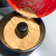 Transfer the mixture into the prepared pan. Bake for 60 minutes.