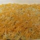 Top layer of soup mixture and cheese over tortillas