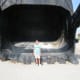 My fifth grad daughter standing directly in front of Big Brutus' bucket.