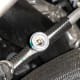 The Schrader valve under the AC charging port cap.