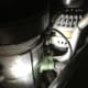 AC compressor leaking freon with a fluorescent dye tracer.