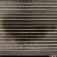 Oil spots on AC condenser cooling fins.