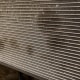 Oil spots on AC condenser cooling fins.
