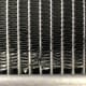 Rock damage to an AC condenser