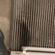 Oil spots on AC condenser cooling fins.