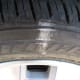 The outer front tire has scuffed all of the shoulder grooves, and the car wasn't even leaning. It needs more air.