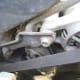 I. Loosen the alternator bracket pivot bolt