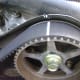 GG. Put the new belt onto the right camshaft sprocket, using the paint mark on the belt for alignment.