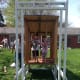 View from the door side of the coop/run. We had a wood screen door that we are repurposing as a door for the chicken run.