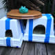 These cat shelters are super simple and made out of just Styrofoam and straw.