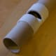 Slot made in a plotter roll which will eventually be a support.