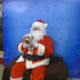 Ginger may be larger than average, but she's not too big to sit on Santa's lap!