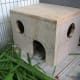 This homemade shelter for an indoor cage is a great comfort to the inhabitants.