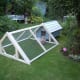 A chicken tractor with a coop attached