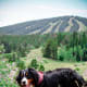 A Bernese Mountain Dog out for a hike.