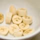 Slice a banana and place in a medium mixing bowl.