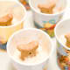 Keep pupsicles in the freezer until ready to give as a treat. To remove from the cup, gently squeeze the sides and the bottom to release from the cup.