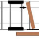 2nd - Lay the board cock-eyed and hammer one end until it is square to the trailer.