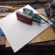Sheets of plywood used to make cat flap insulator.