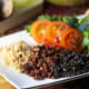 Cooked white, red, and black quinoa