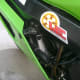 Location of the idle adjustment screw.