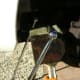 Use a jack stand or another other support tool before attempting to loosen the crankshaft pulley bolt.
