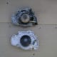 Old water pump compared to new water pump.