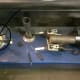 Steering column disassembled to show torque sensor (circled with arrow). Notice the steering assist motor on the far right side of the picture.