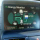 Engine off, regenerating energy by slowing down.