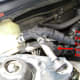 V. Disconnecting the power steering fluid reservoir