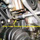 E. Power steering pump belt adjustment bolt