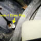 C. Drain plug removal