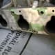 Partial removal of old intake manifold gasket.