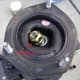 Remove the upper strut mount nut and bushing <div> <div> <div>  <104} <104} <div> </div> <div><img src=