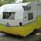 After: Bright gloss white paint on the roof helps keep the cool, while the 50:50 white gloss and John Deere yellow paint kick the lower half of the Shasta into high gear.