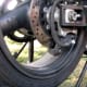 Location of the rear caliper on the bottom of the brake rotor.