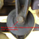 Remove the upper motor mount bolt.
