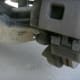 Lower bolt location. It has been partially removed to make it easier to see in the photo.